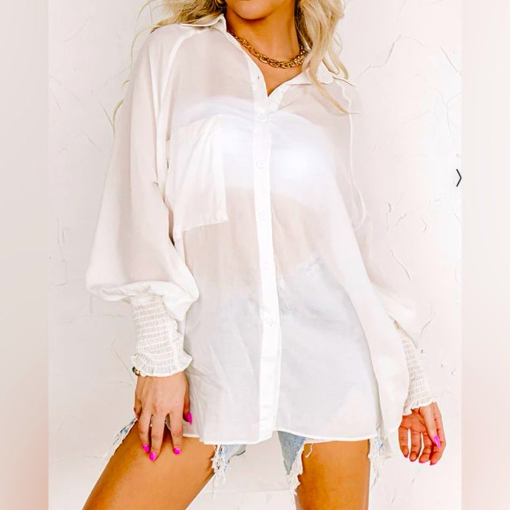 Flawless lightweight ivory blouse with smocked forearm cuffs